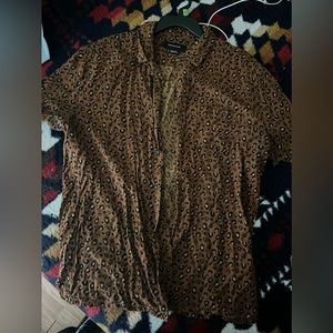 Cheetah print button shirt.